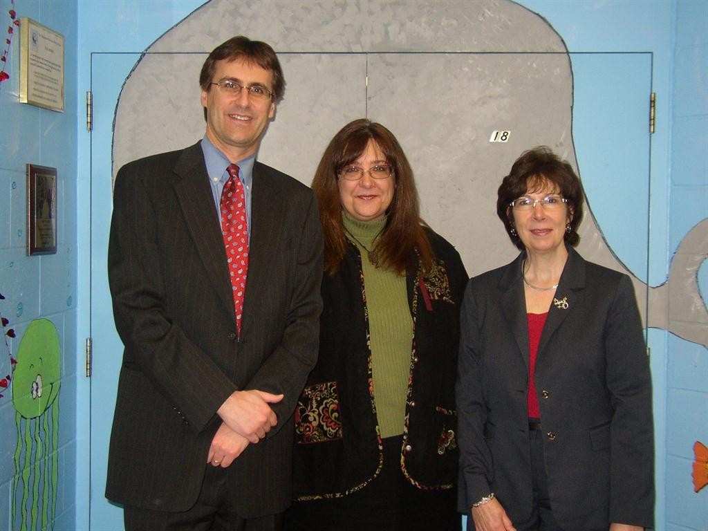 (Pictured left to right: Terry Plizga, Vice President M&T Bank, Sandra Soroka, Executive Director, The Neighborhood Center, Inc., David Manzelmann, Market President, M&T Bank)