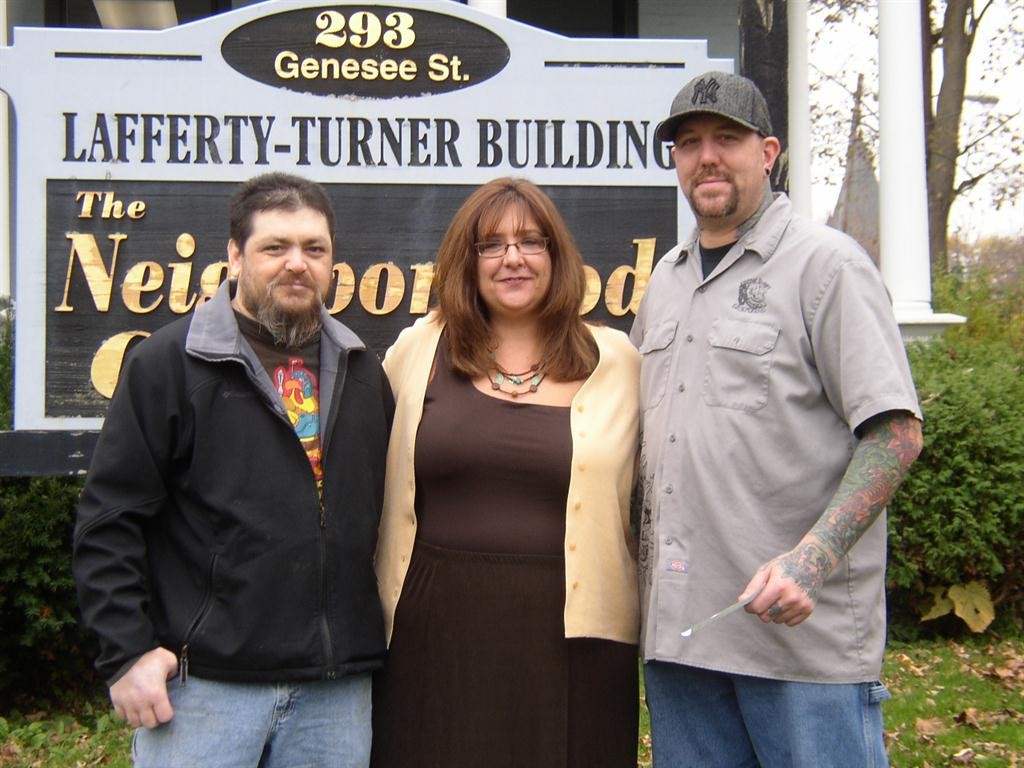 (Pictured left to right: Randy Smith, Eternal Images, Sandra Soroka, Executive Director, The Neighborhood Center, Inc., Todd Hunter, Owner of Eternal Images) 