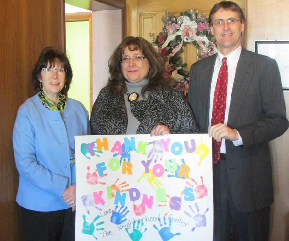 (Pictured left to right: Terry Plizga, Vice President M&T Bank, Sandra Soroka, Executive Director, The Neighborhood Center, Inc., David Manzelmann, Market President, M&T Bank)